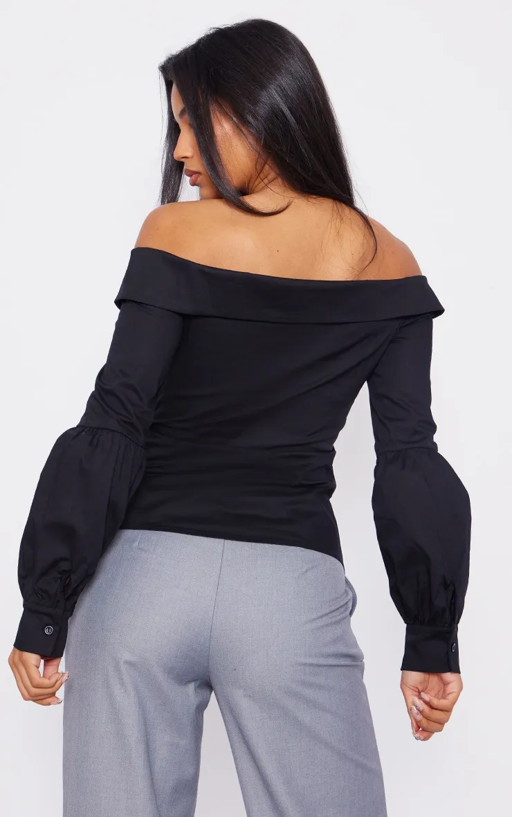 Chemise noire à col bardot replié