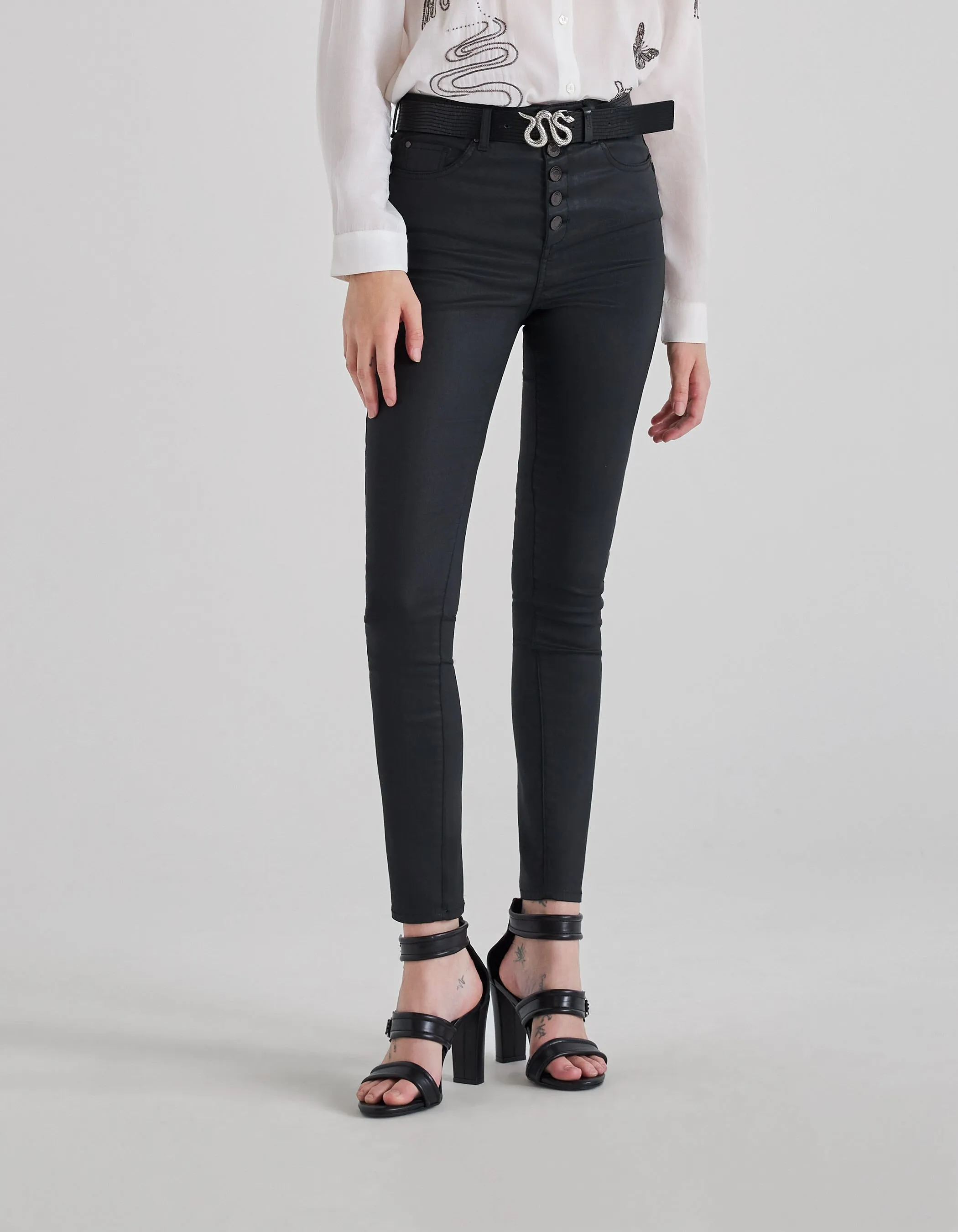 Jean slim noir enduit taille haute Femme