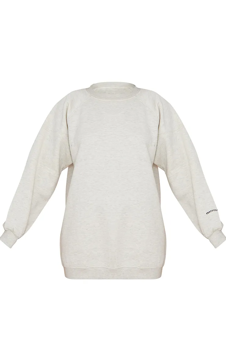 PRETTYLITTLETHING Robe en sweat avoine oversize à manches raglan