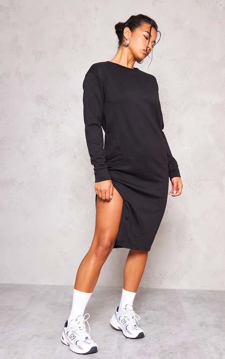 Robe pull mi-longue oversize noire fendue en sweat