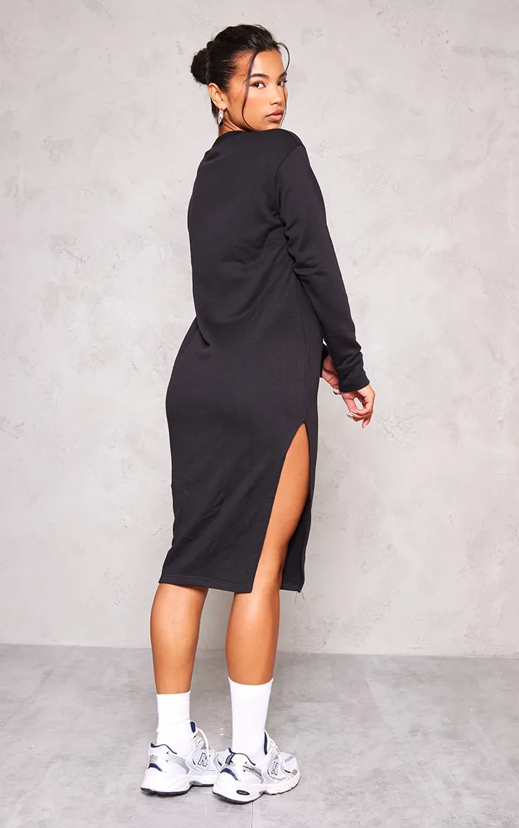 Robe pull mi-longue oversize noire fendue en sweat