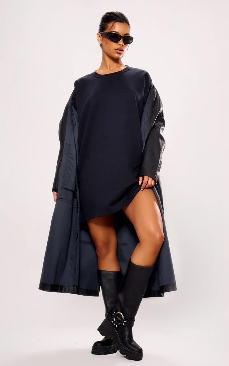 Robe pull noire oversize en sweat à manches longues