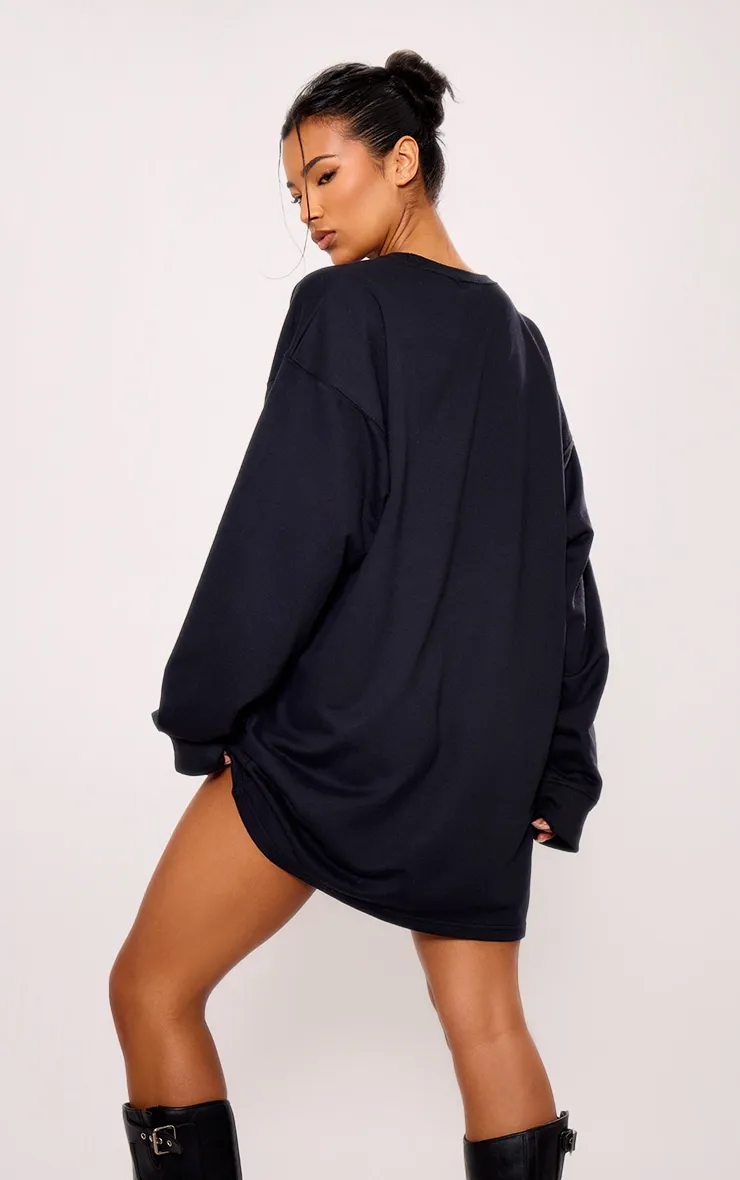 Robe pull noire oversize en sweat à manches longues