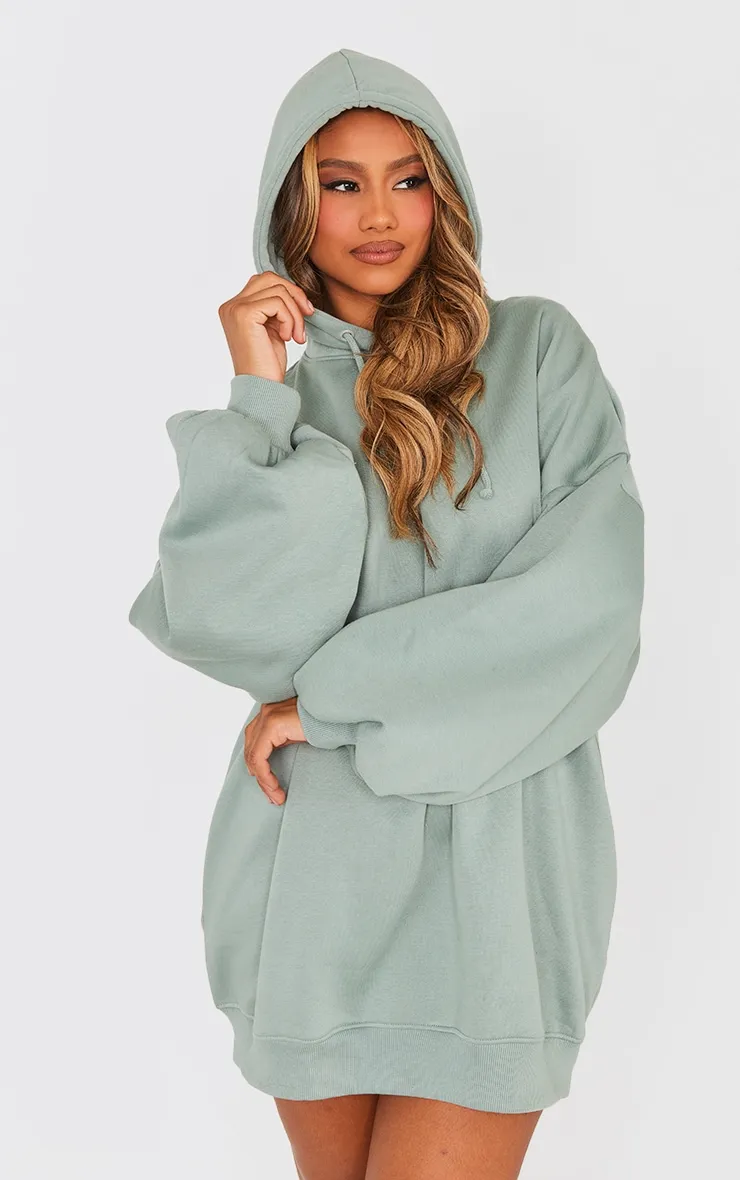 Robe pull oversize en sweat bleu-vert à capuche