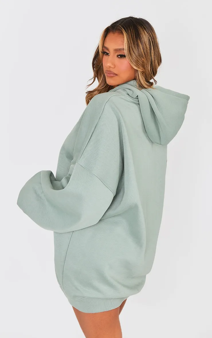 Robe pull oversize en sweat bleu-vert à capuche