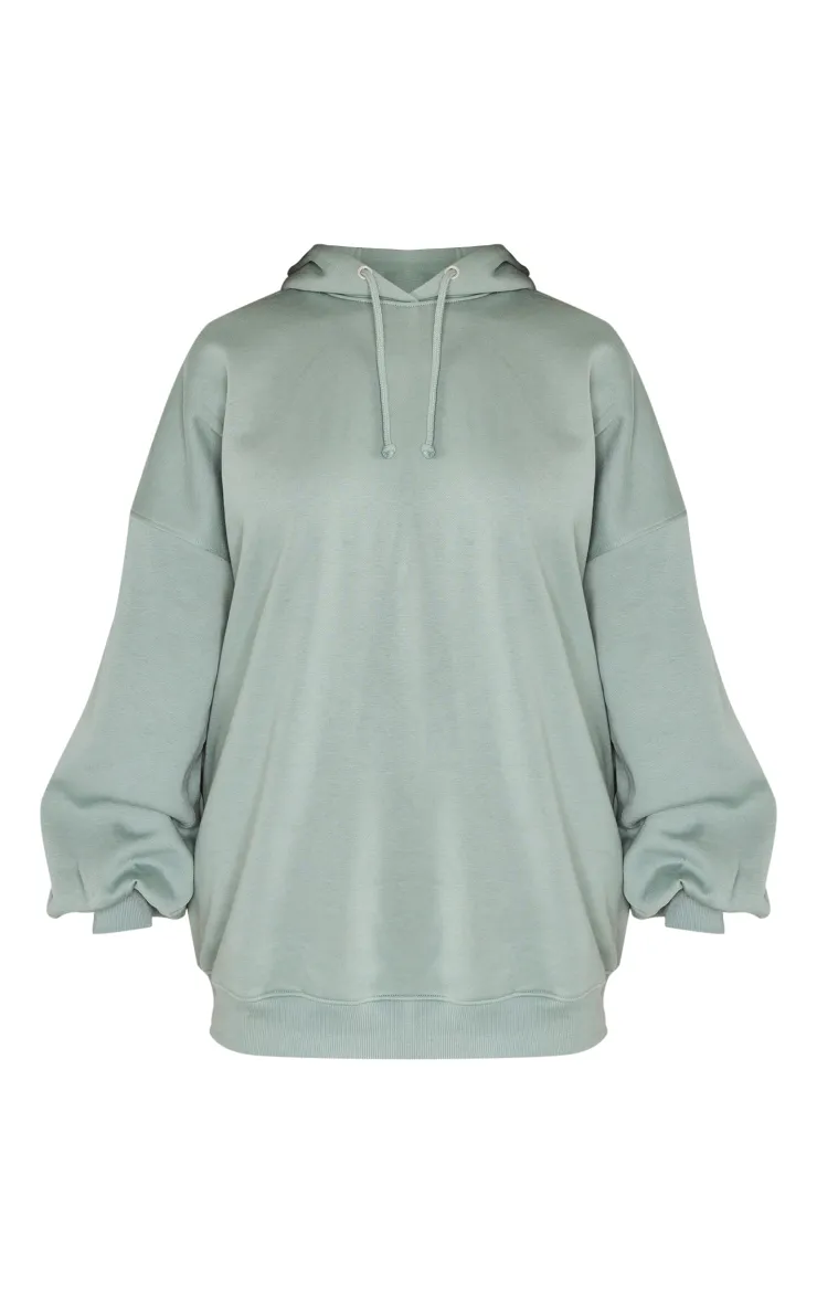 Robe pull oversize en sweat bleu-vert à capuche