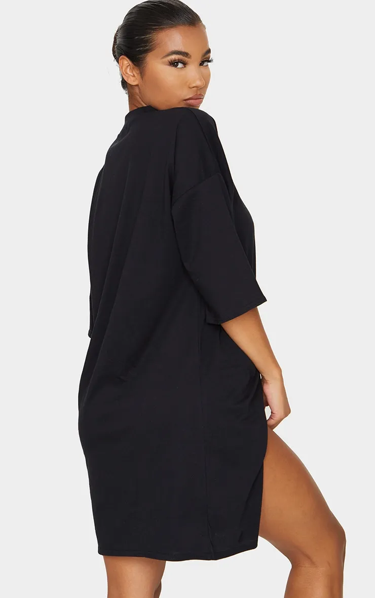 Robe T-shirt noire fendue oversize style boyfriend